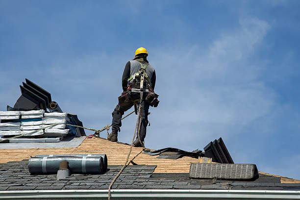 Professional Roof Replacement technician working in Scottown, OH
